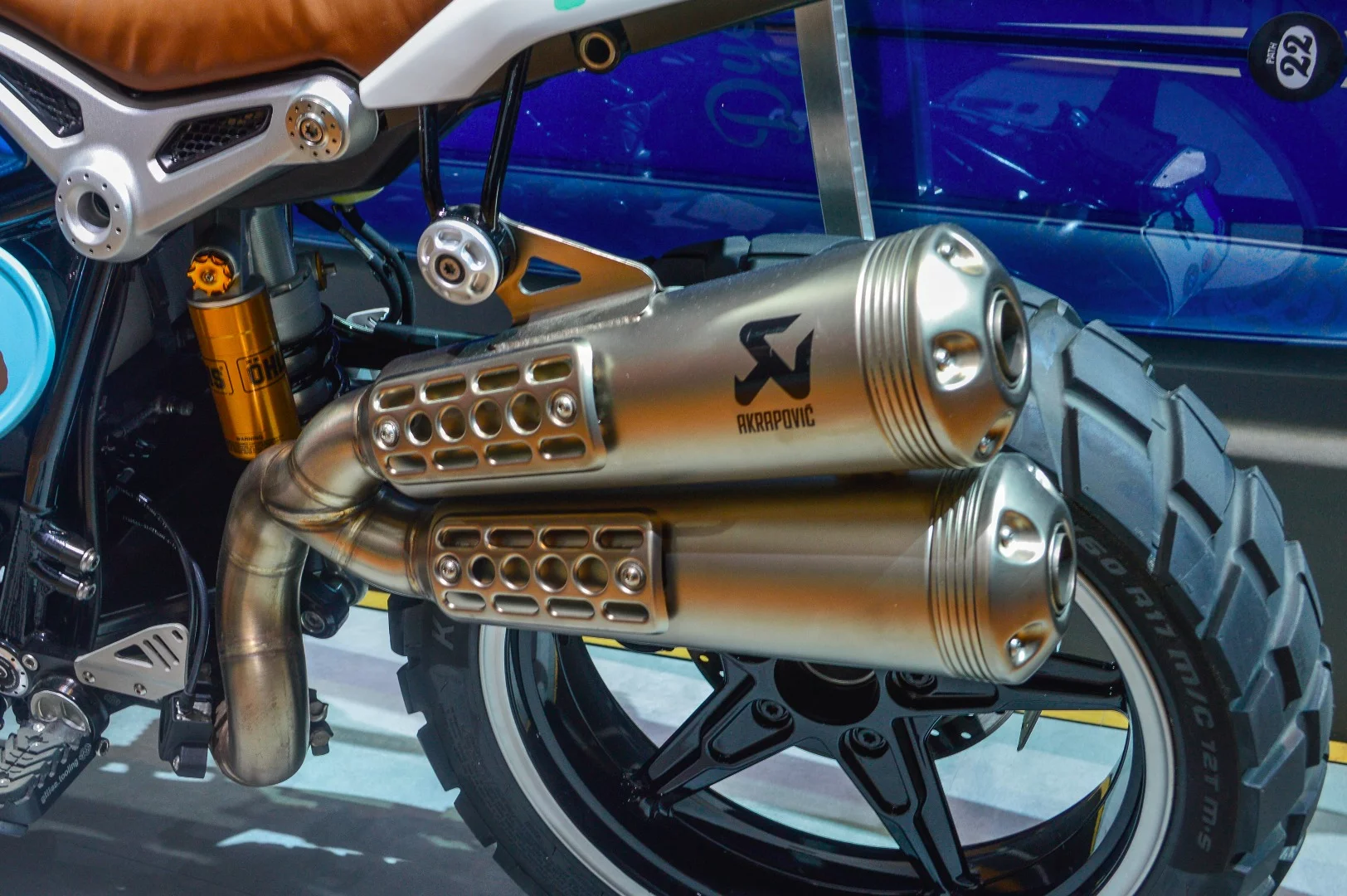 The pair of high-rising Akrapovic exhausts can only be fitted if the passenger pegs' support is removed from the frame