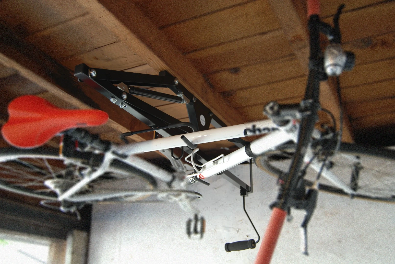 Crafted from aluminum and cold rolled steel, the 7 lb (3.18 kg) Hide-A-Ride is bolted onto ceiling joists and can be installed in spaces as narrow as a hallway