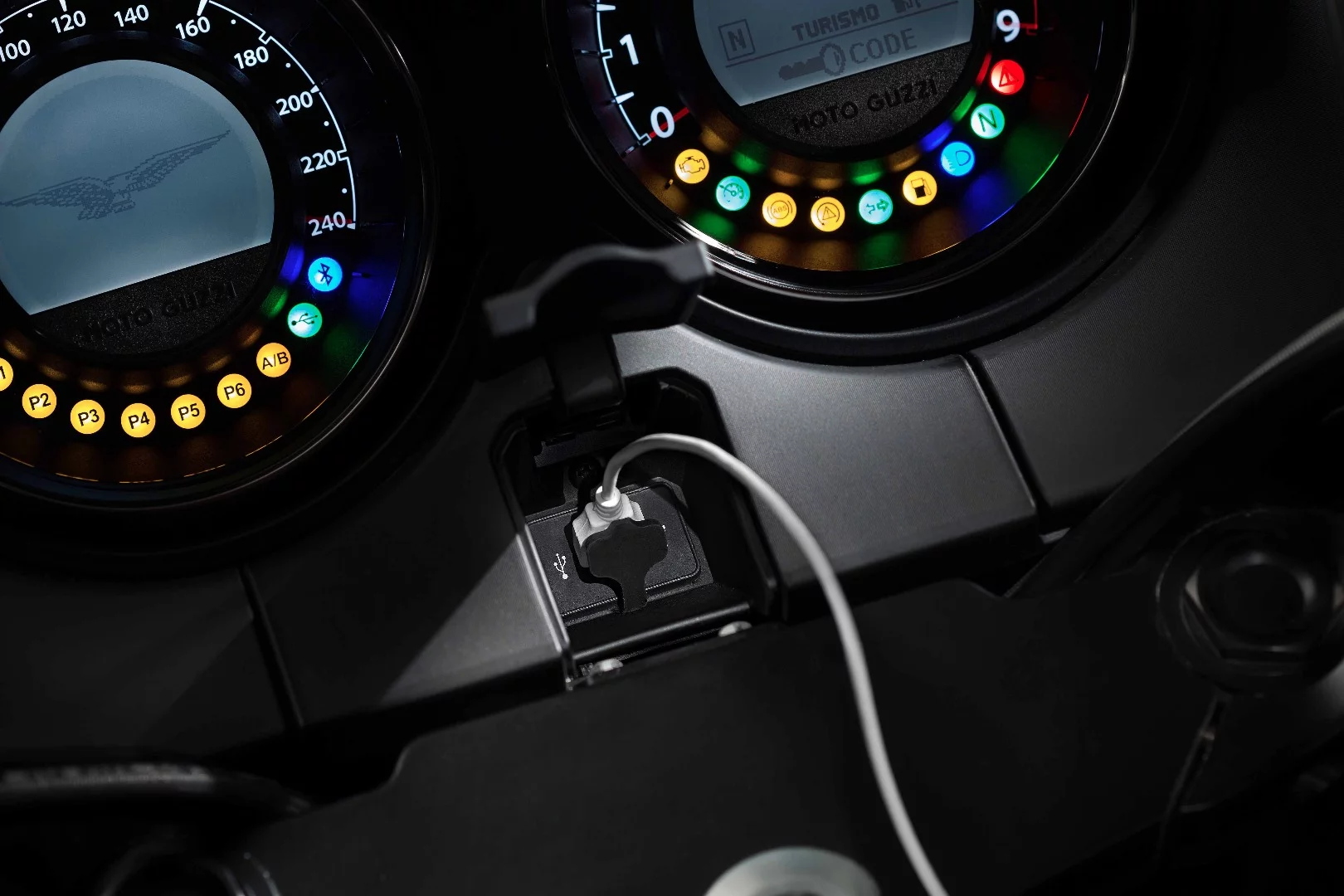 Close up on the dual gage instrument cluster and the USB socket