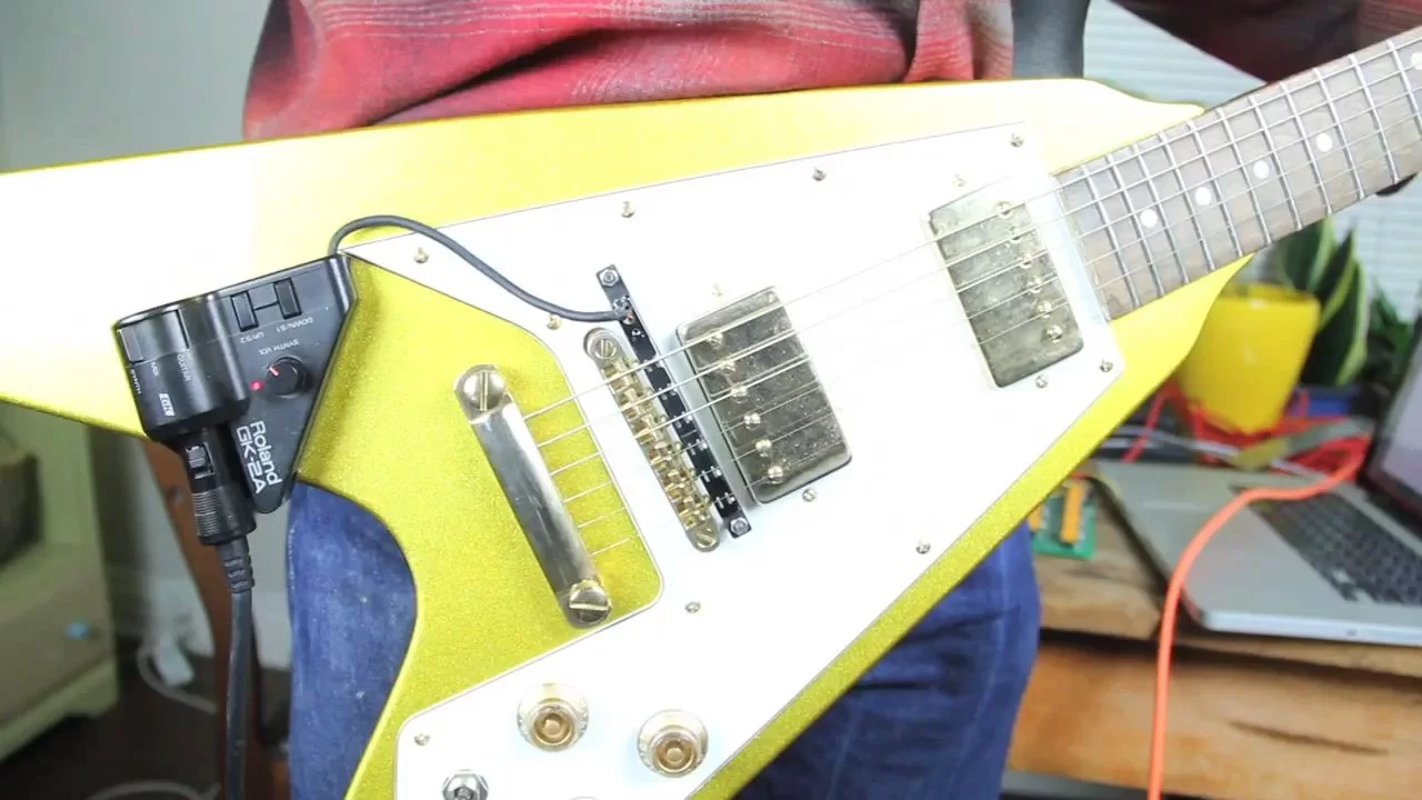 A Roland GK-2A divided pickup mounted on Neevel's Flying V guitar