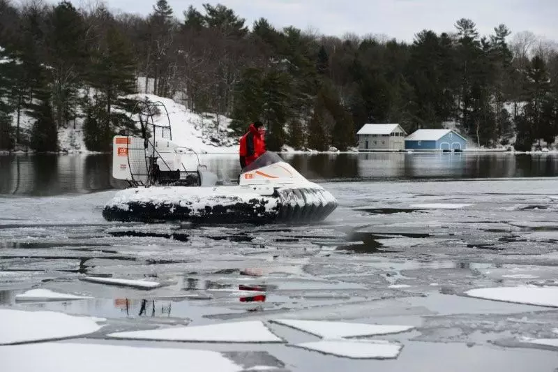 The AirRider hovercraft traveling over open water and ice