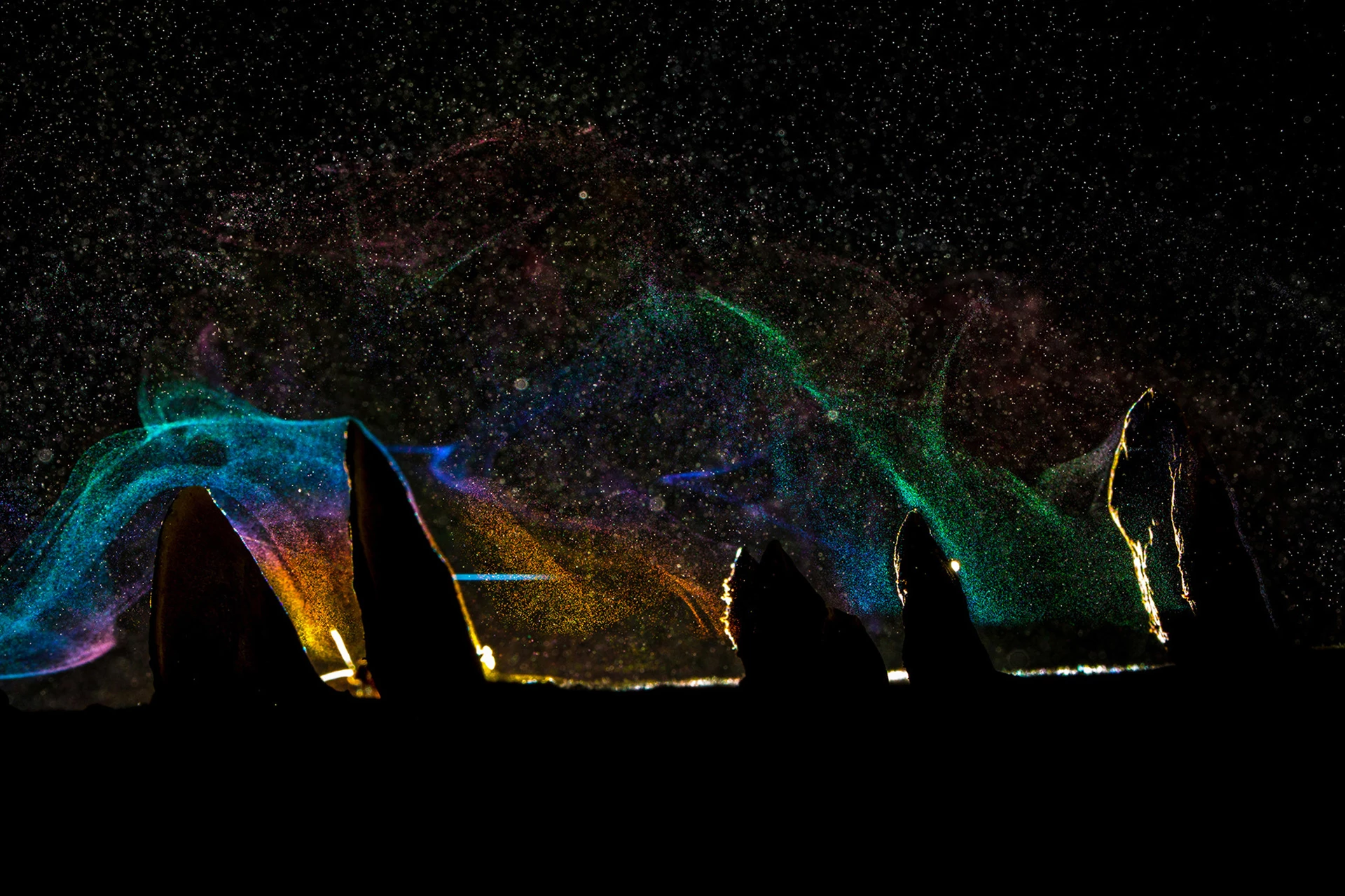 Winner - Creative Nature Photography. Ajoba Parvat, Maharashtra. The spores of a bracket fungus (Polypores) create a vast spectrum of colours when lit from an angle.