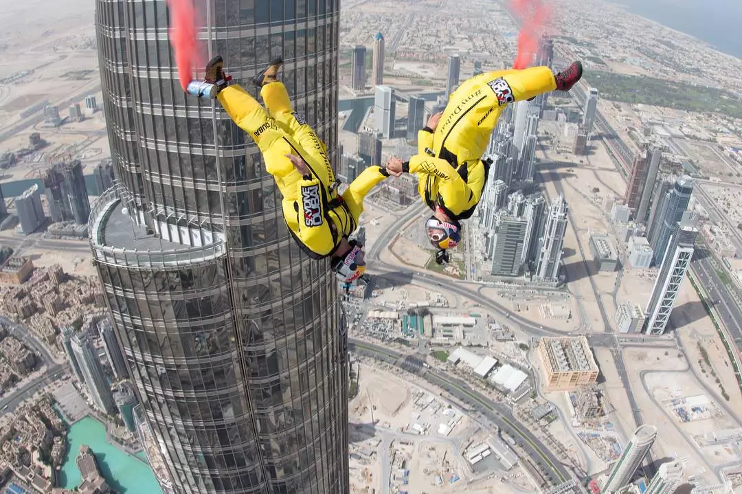 Soul Flyers Vince Reffet and Fred Fugen doing freeflying stunts as they drop from the Burj Khalifa