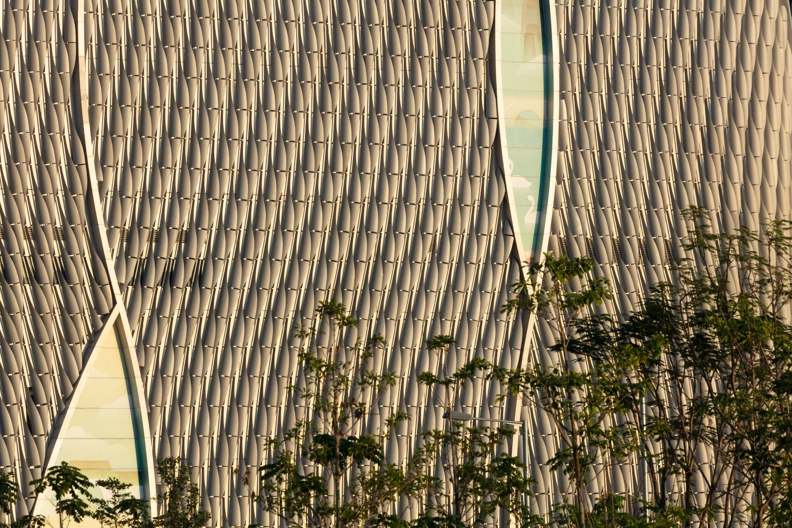 The Xiqu Centre's facade consists of 25,000 pieces of aluminum
