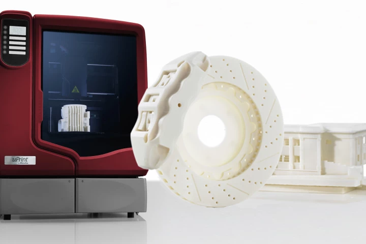 Dimension's uPrint 3D printer and a couple of examples of the kinds of shapes it can print.