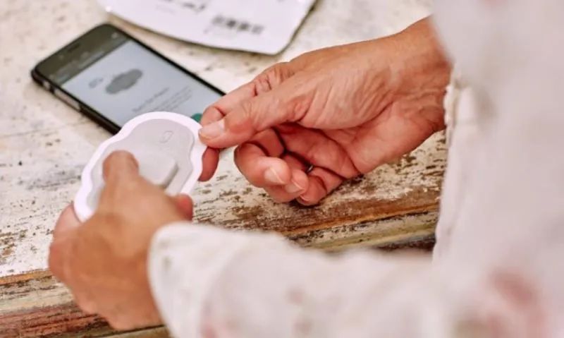 The patient wears a small patch that receives the sensor data from the pill and sends it to an app for recording