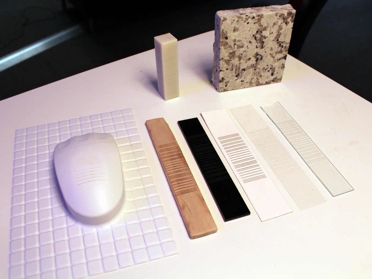 Acoustic barcodes can be incorporated into a variety of materials, including polystyrene (vacuum-formed), paper, transparency, wood, glass, acrylic, granite, and a 3D-printed object