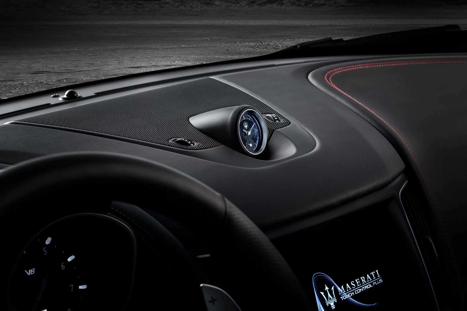 The Levante Trofeo features a uniquely styled Maserati clock