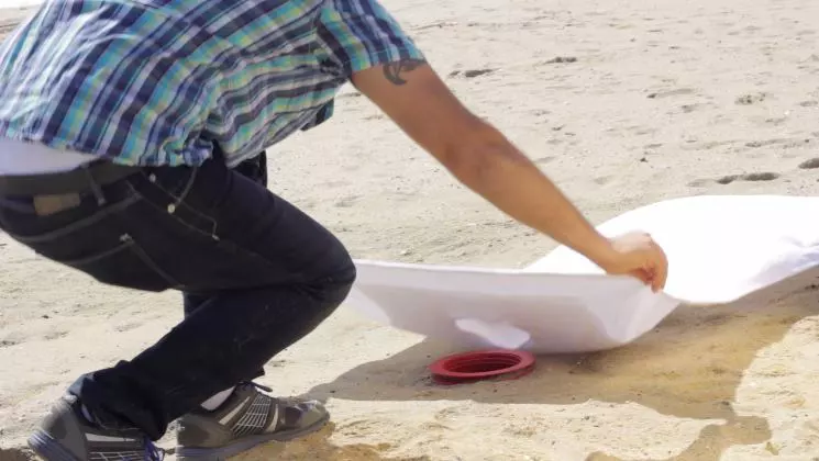 A special flap holds a pillow while also concealing a hole that fits around the mouth of the capsule, designed to give easy access to your items