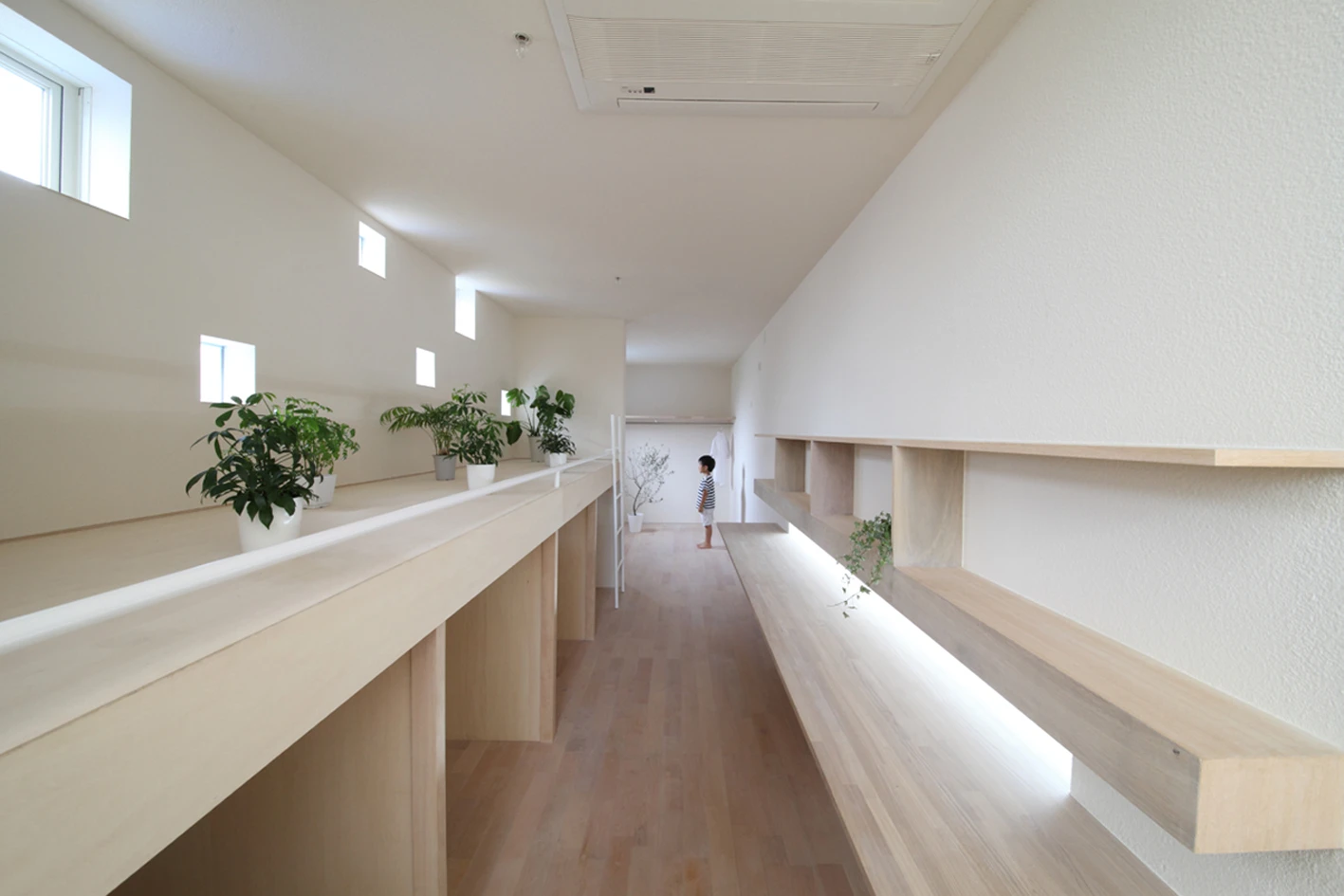 The width of the house is roughly equivalent to the length of an average American family car (Photo: Katsutoshi Sasaki and Associates)