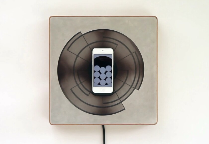Spira uses the heat from your charging smartphone to reveal the spiral design picked out in chromatic paint
