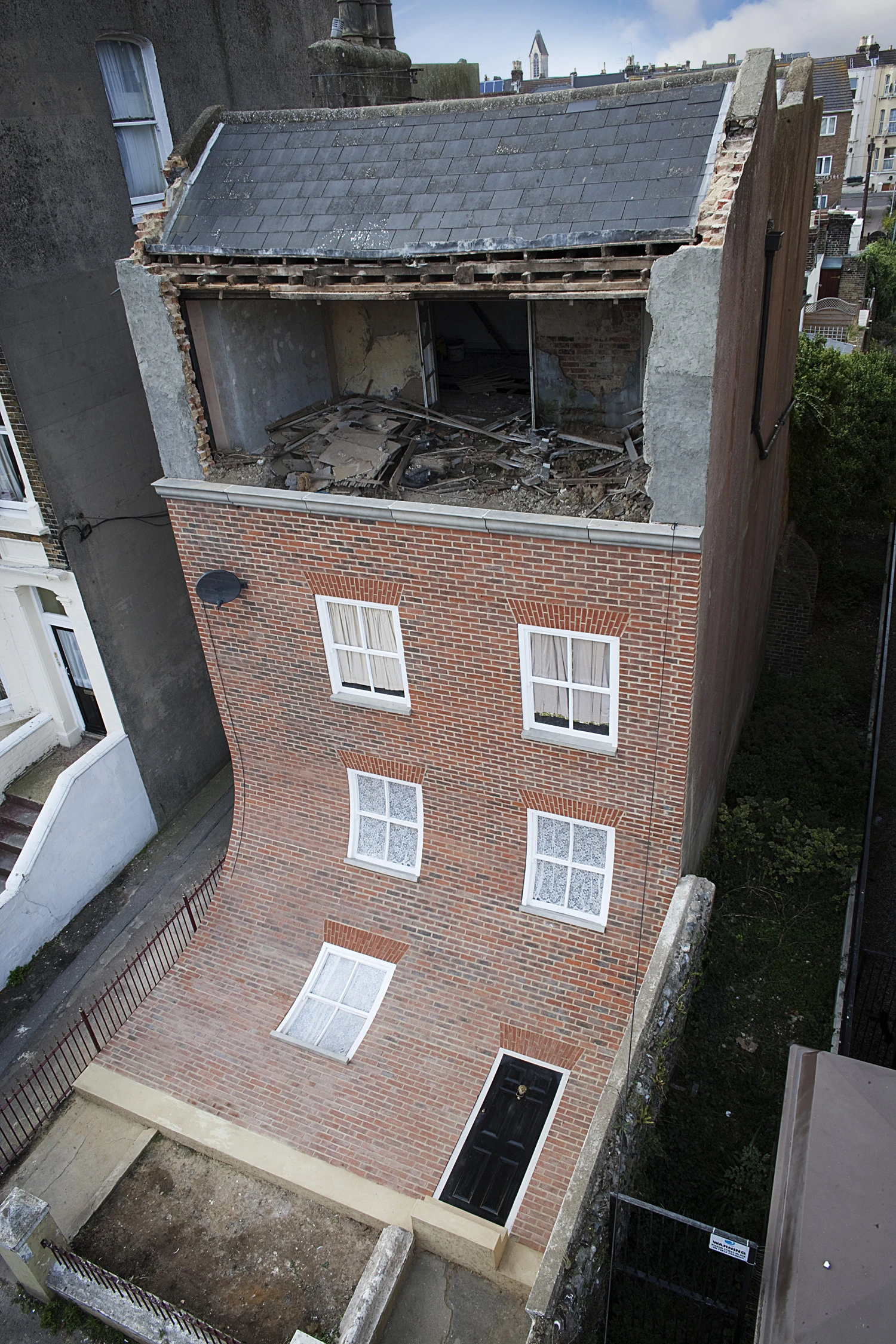 The work is titled From the knees of my nose to the belly of my toes (Photo: Alex Chinneck)