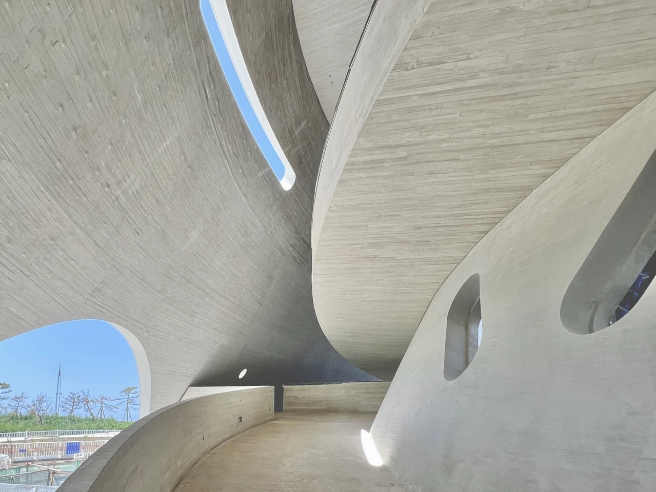 The Sun Tower's outer concrete shell is connected to light tubes, which will channel natural light into the interior during the daytime