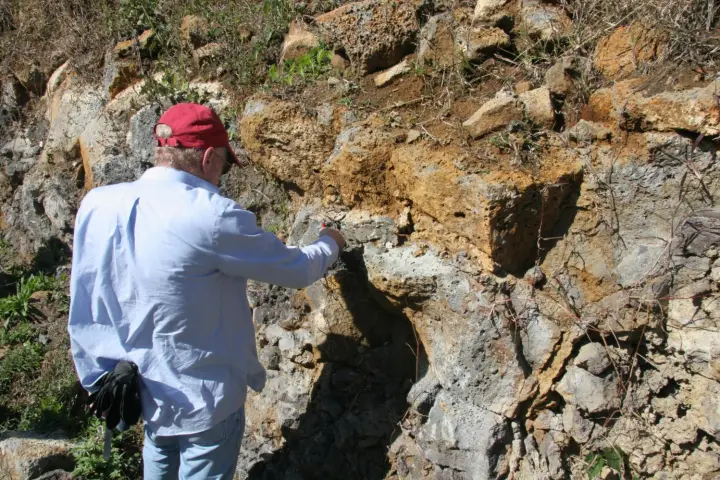 On site in Mauritius: Lewis Ashwal studying volcanic rocks that contain six billion-year-old zircon grains