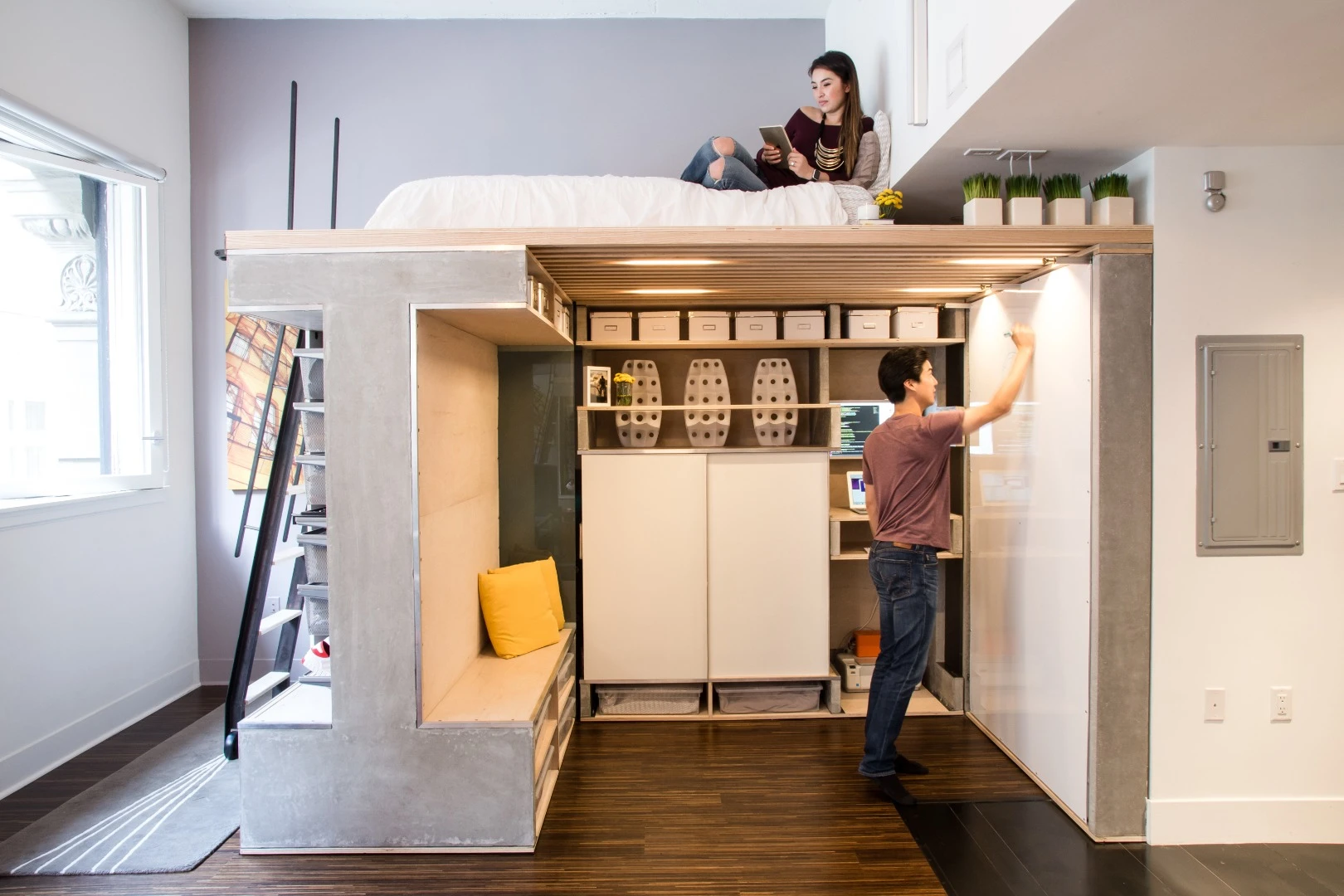 The underside of the fold-down bed is a dry-erase board