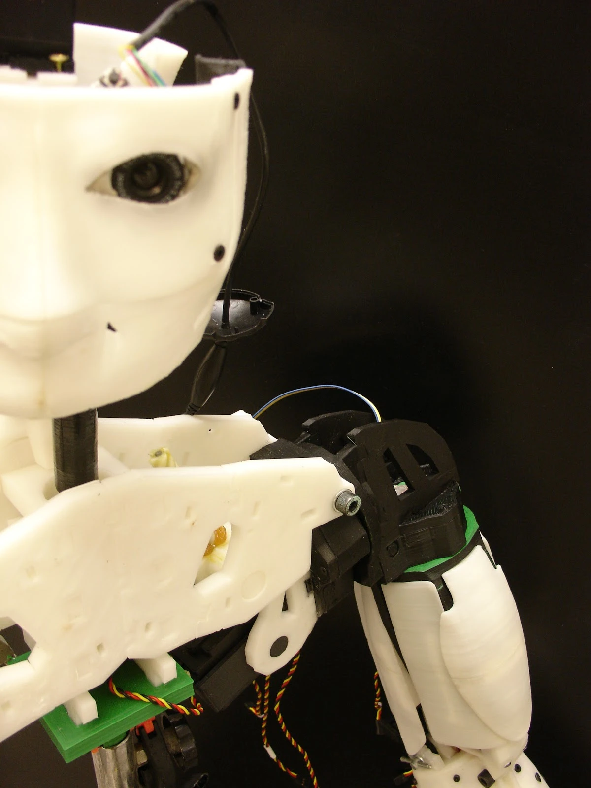 A close-up of InMoov's head and shoulder joints