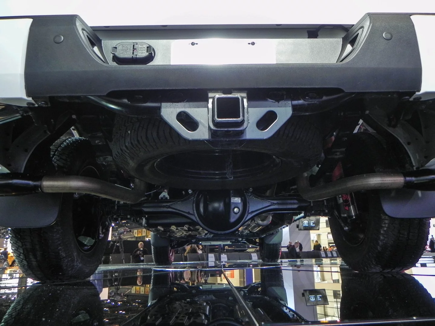 The blacked dual exhaust tips and improved rumble of the Tundra TRD Pro are seen in the tuning underneath the carriage