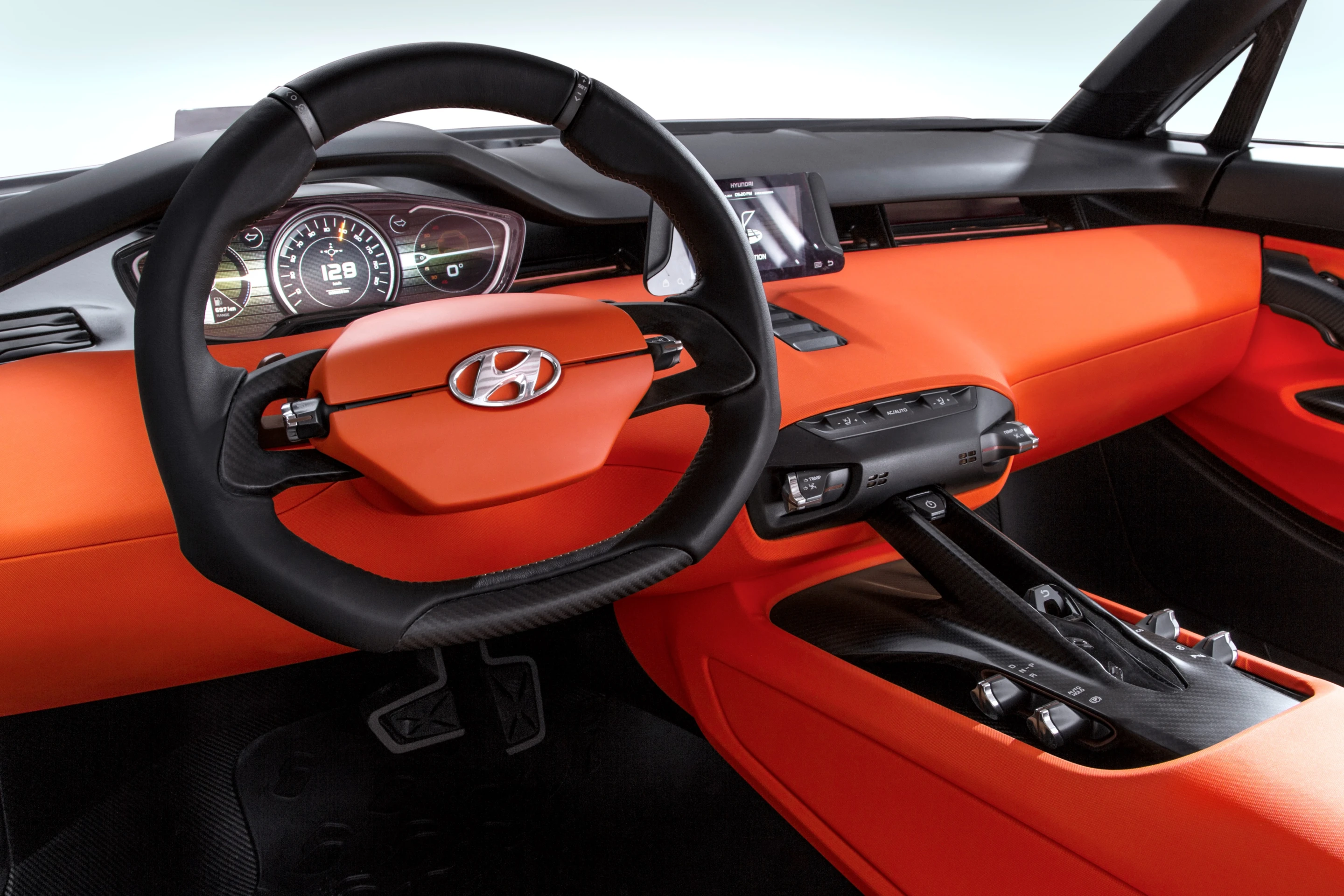 The interior blends bright orange with exposed materials and components
