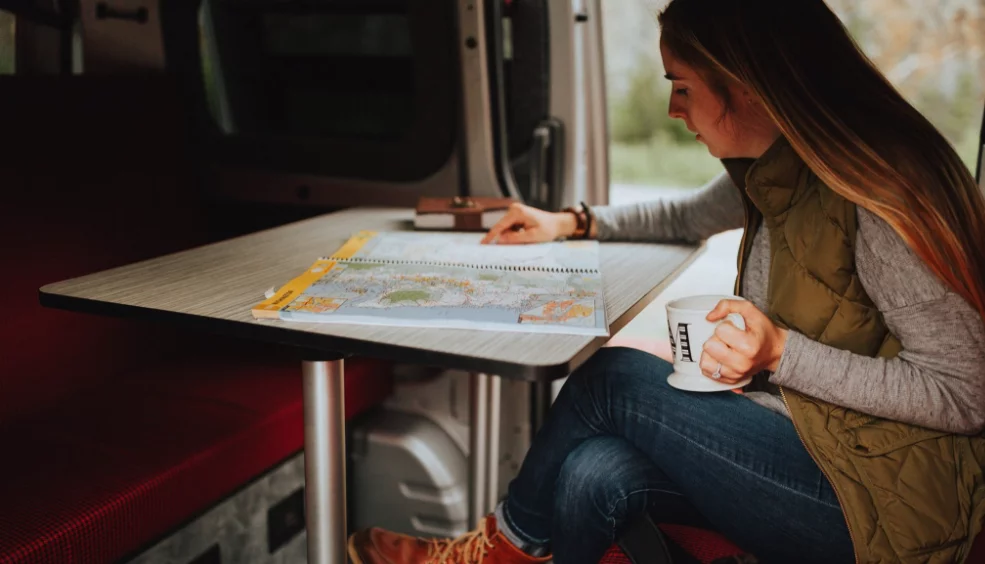 The cushions also create dual benches around the convertible dining table