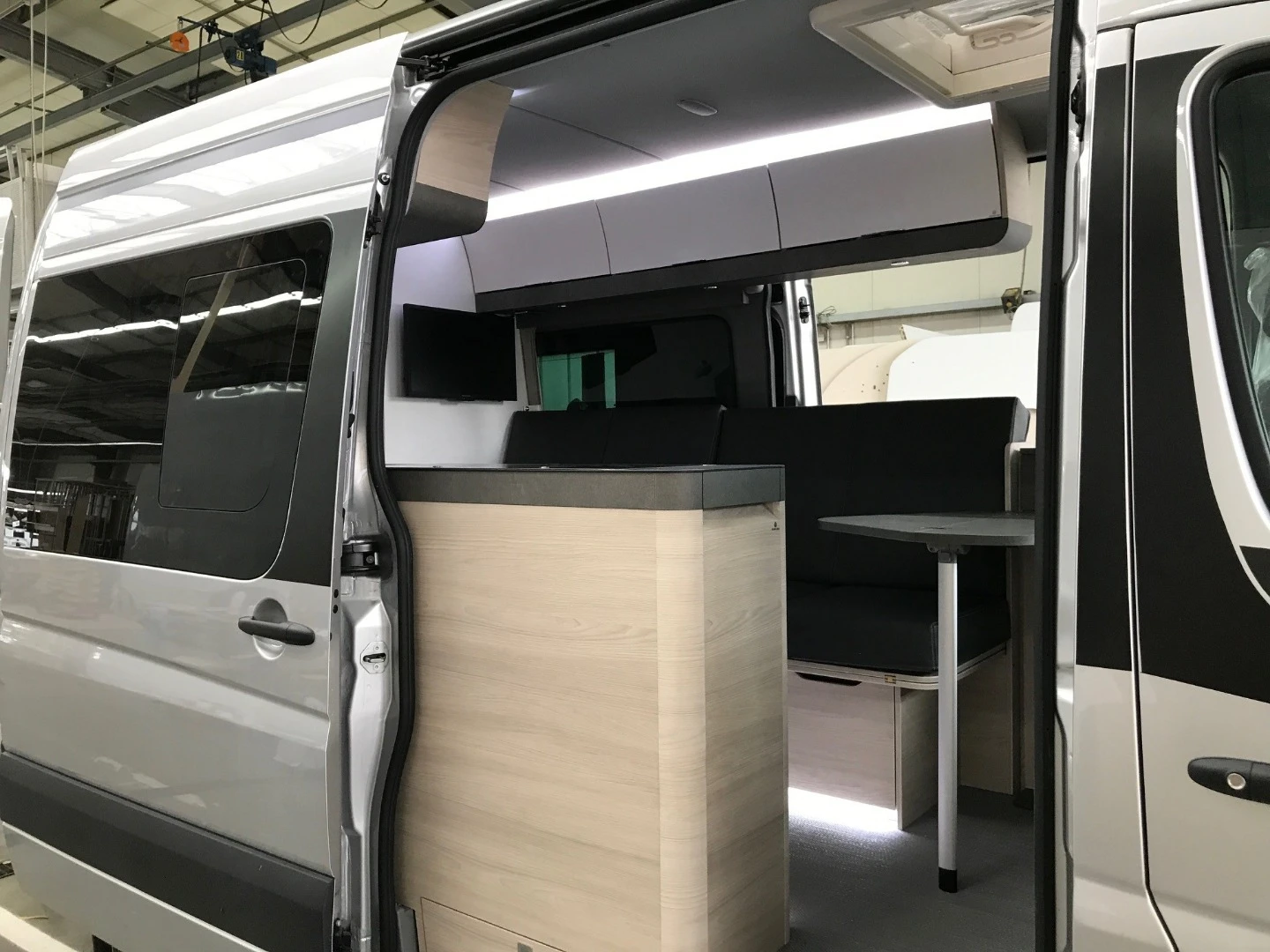 The DuoCar S concept had a similar main cabin layout, albeit with an extraneous driver-side door and unvarnished look