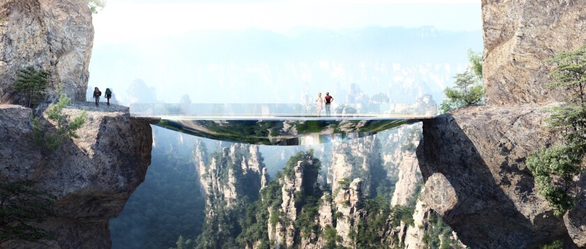 This bridge takes the form of an elliptical disk, with an off-centered hole covered by a net that allows fearless types to lay down in the void