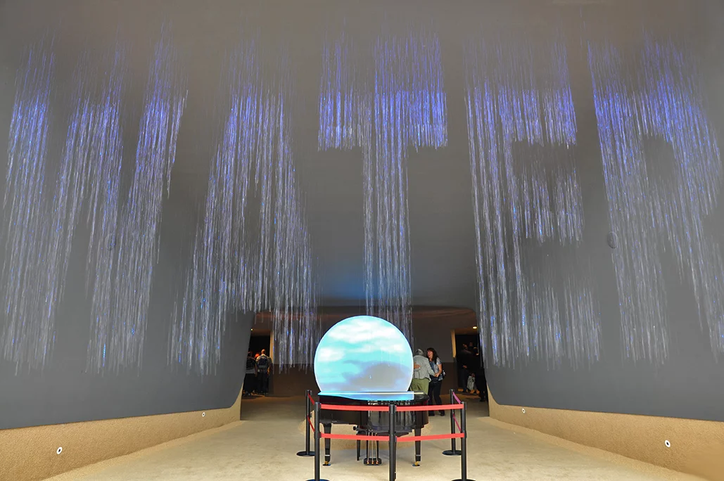 Dramatic water feature with light projection featured in the Kuwait Pavilion