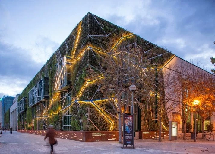A corner view of the building with the frame lit-up