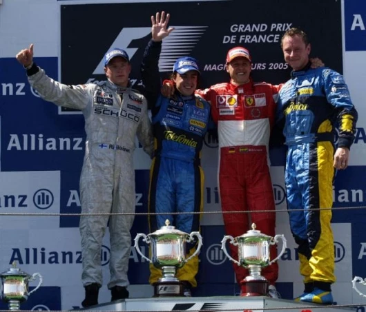 The three main contenders and Renault crew member share the podium - bookies have Alonso at 2/1 on, with Raikkonen at 7/2, Schumacher at 11/1 and the rest of the field at 150/1