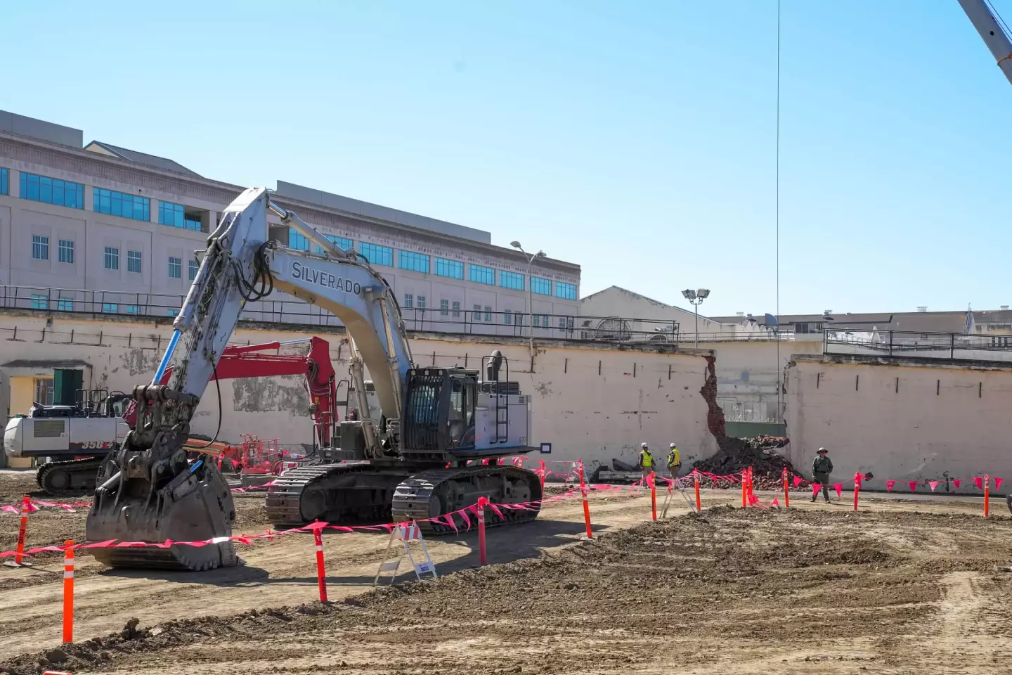 The San Quentin Rehabilitation Center's construction has involved removing an inner wall and demolishing a warehouse