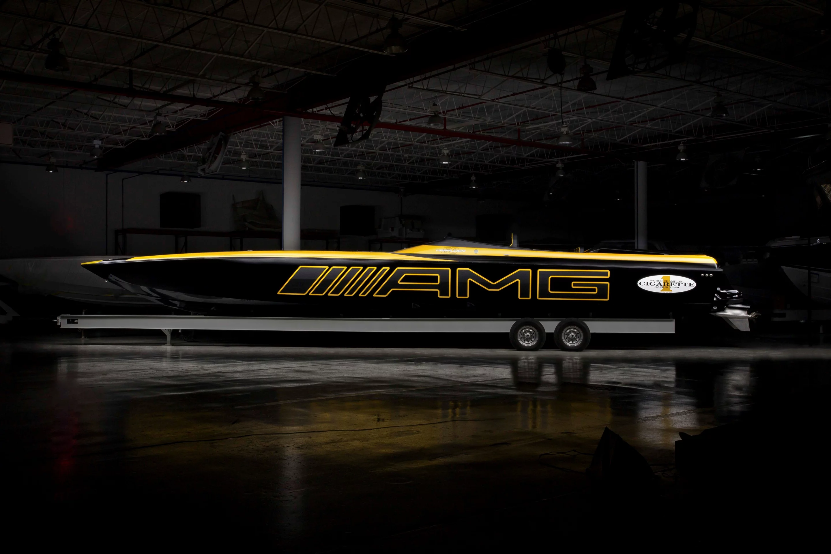 While Mercedes and Cigarette create a nice boat every year, their warehouse photos leave something to be desired - like photos and video of it in the water