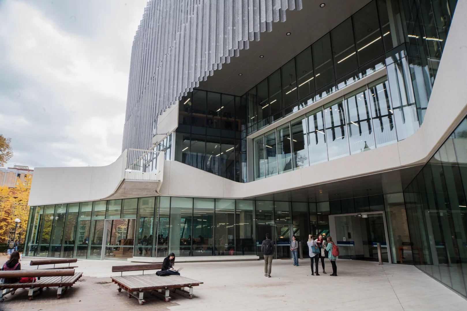 On the ground floor of the building, a thoroughfare handles foot traffic from all across the university