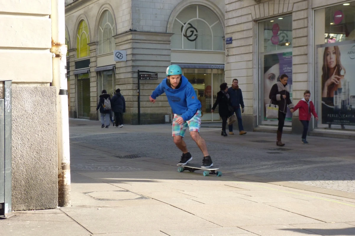 Bird riders control the electric longboard using their feet, not their hands