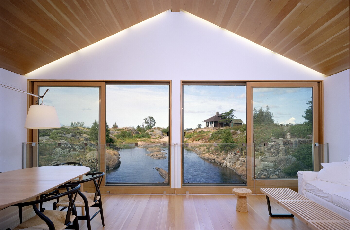 Large windows open to light and views (Photo: Florian Holzherr, from the forthcoming book "Superlight")