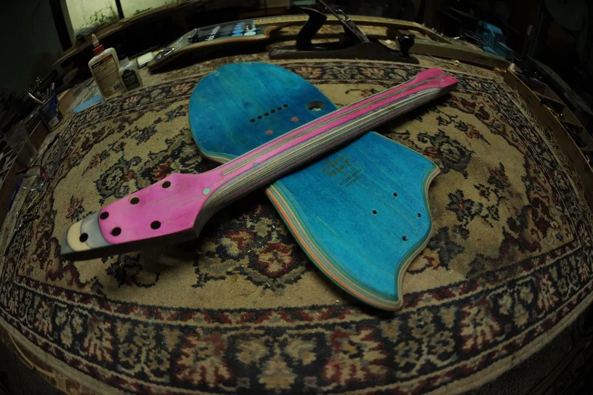 A handmade Skate Guitar ready for assembly