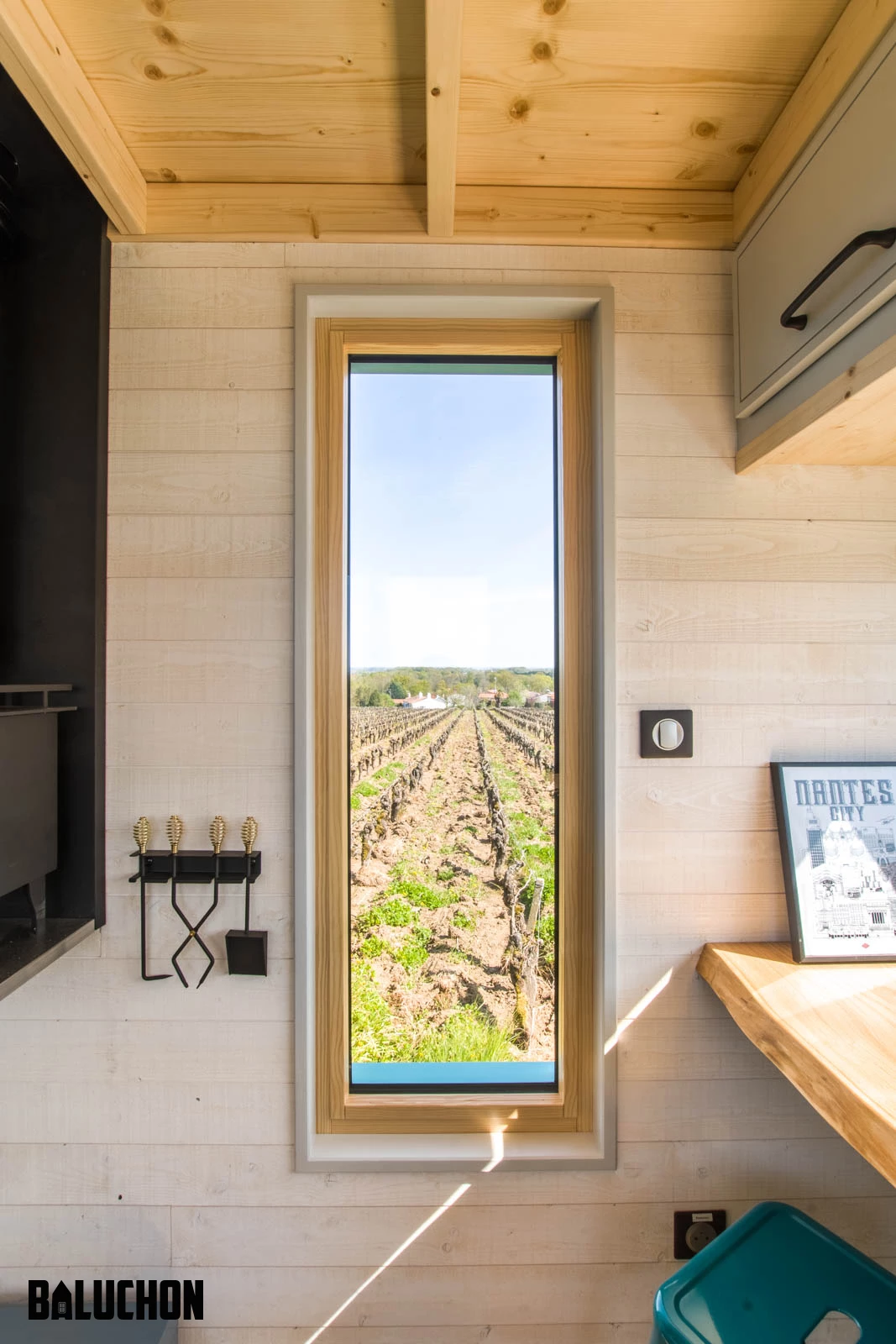 Tiny House Sïana's interior looks quite light-filled thanks to generous glazing