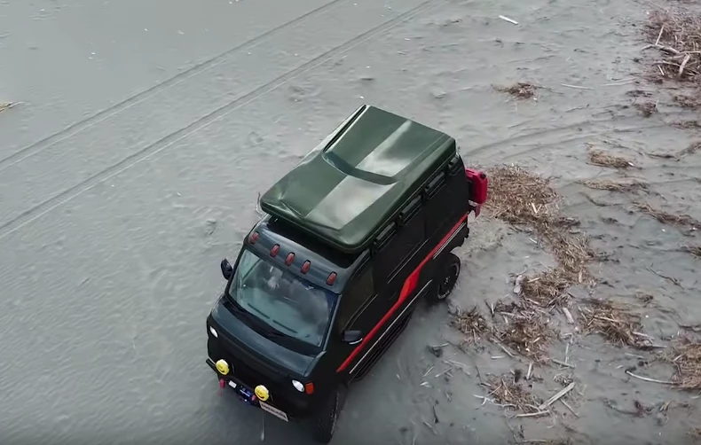 The roof-top tent makes the tiny Every a four-sleeper