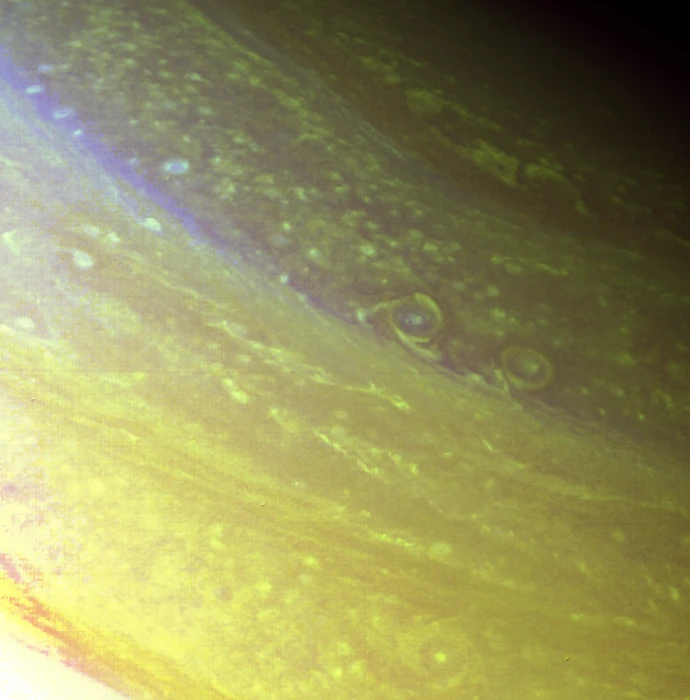 The north polar region of Saturn is pictured in great detail in this Voyager 2 image obtained Aug. 25 from a range of 633,000 km (393,000 mi)