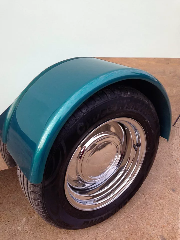 The Gidget rolls on 15-in custom chrome wheels
