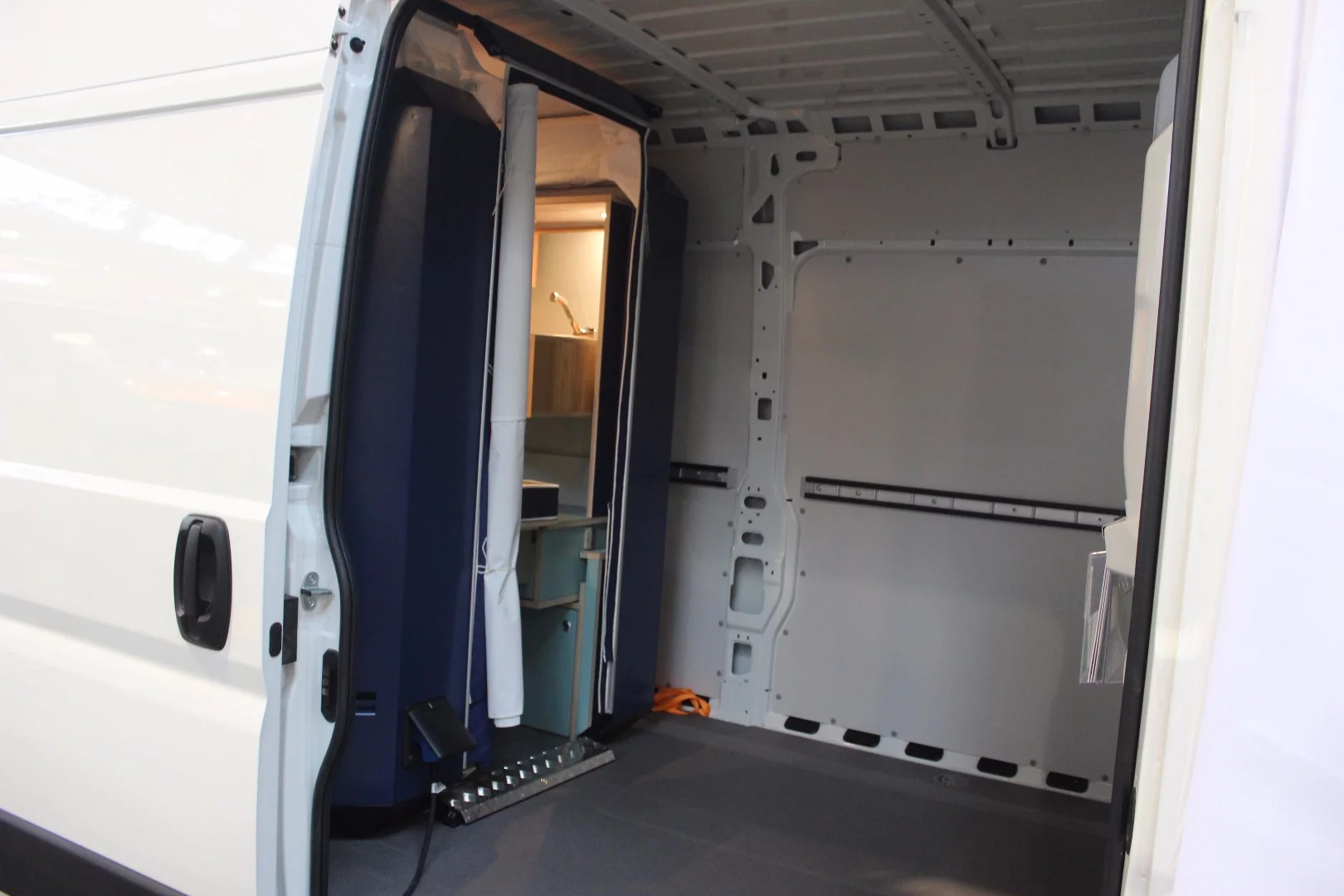 The installed PlugVan still leaves plenty of cargo space in the van