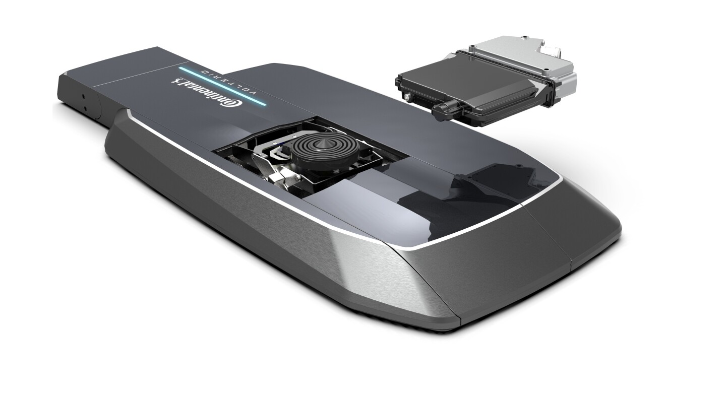 The robotic charger has a ground unit that sits or bolts to the ground and a receiver on the car itself