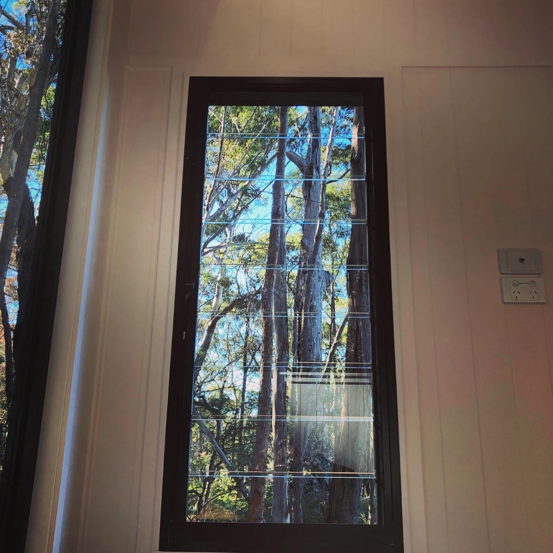 A series of cross flow ventilation windows with louvers provide good airflow throughout the home