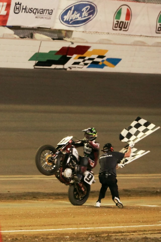 Jared Mees celebrates a win with a wheelie