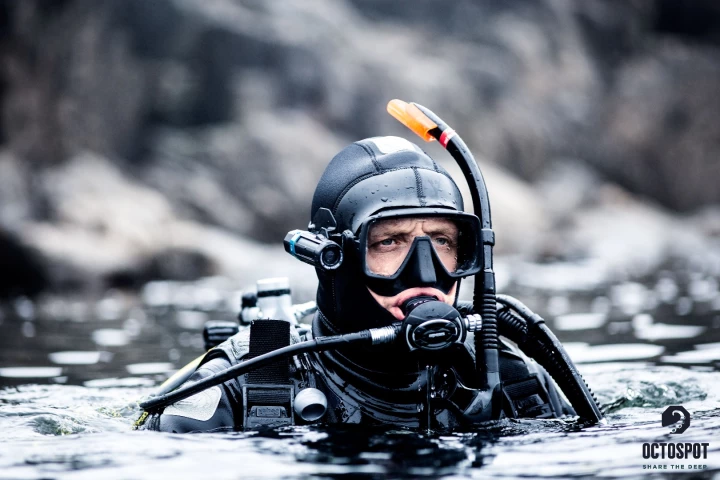 The Octospot (on mask strap) is designed by and for divers