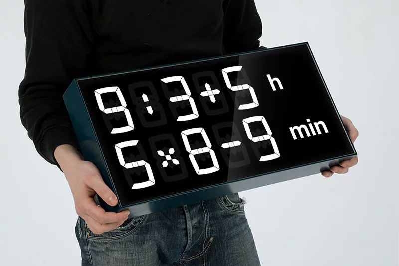 Kids need to solve math equations in order to figure out the hour and minute