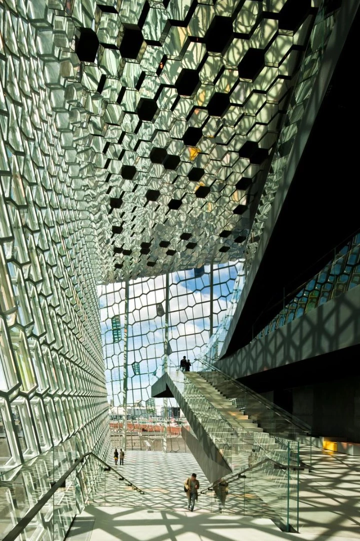 Harpa Concert Hall and Conference Centre is located in Iceland and was designed with Batteriid Archtects. The eye-catching facade was also developed by Henning Larsen Architects in collaboration with the artist Olafur Eliasson
