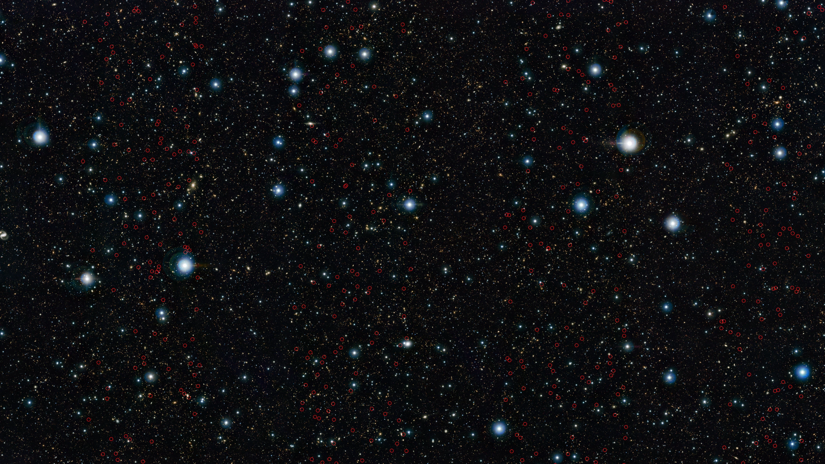 The research identified a host of distant massive galaxies in a small patch of sky around four times the size of the Moon