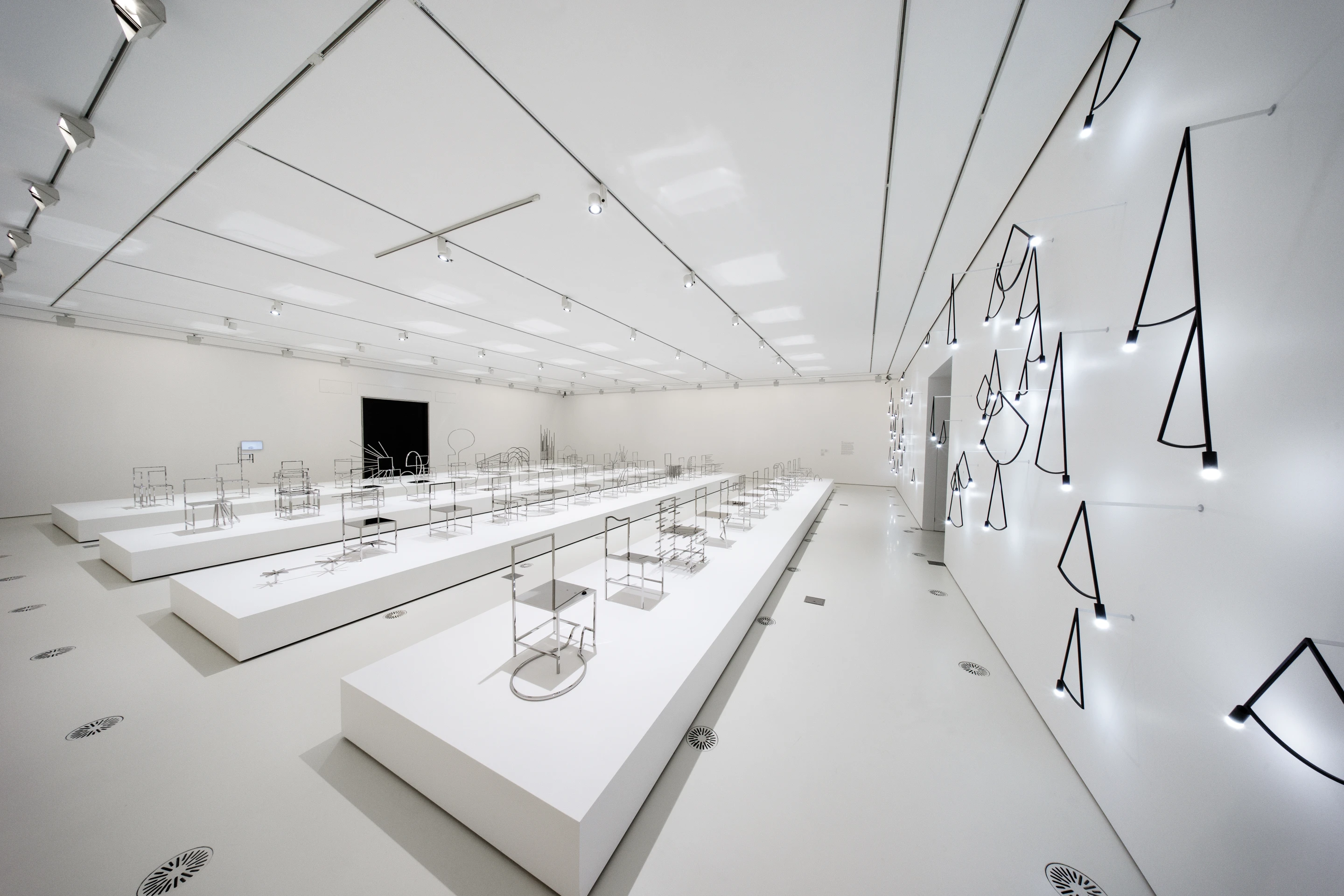 Installation view of Nendo, Manga chairs, 2015 on display in NGV Triennial at NGV International, 2017