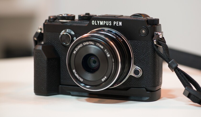 The Olympus PEN-F with the optional grip attached