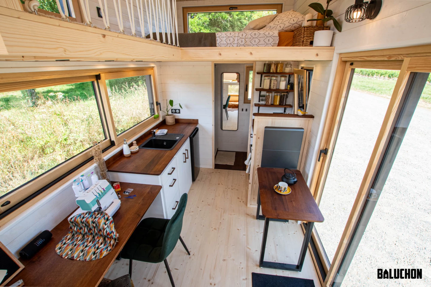 The Nouvelle Dans' kitchen includes a small dining table