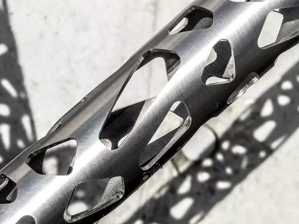 In order to showcase their laser-cutting technology, the makers have cut a series of cellular-structure-inspired designs out of each tube